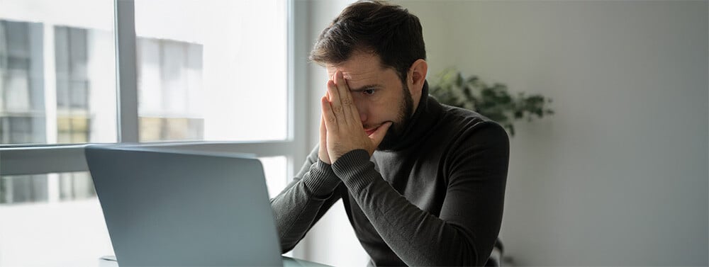 side-view-anxious-man-working-home copy